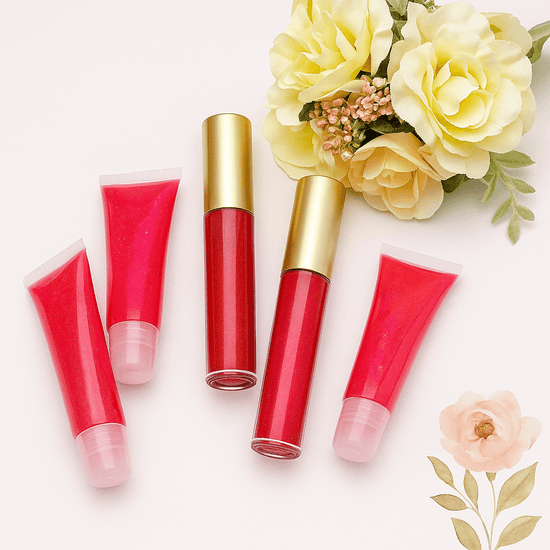 Fleurish Beauty Handmade Lip Gloss in vibrant red shades, showcasing cute gloss tubes with flowers in the background.